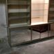 Ivory-colored and matte gold anodized aluminum display bookcase