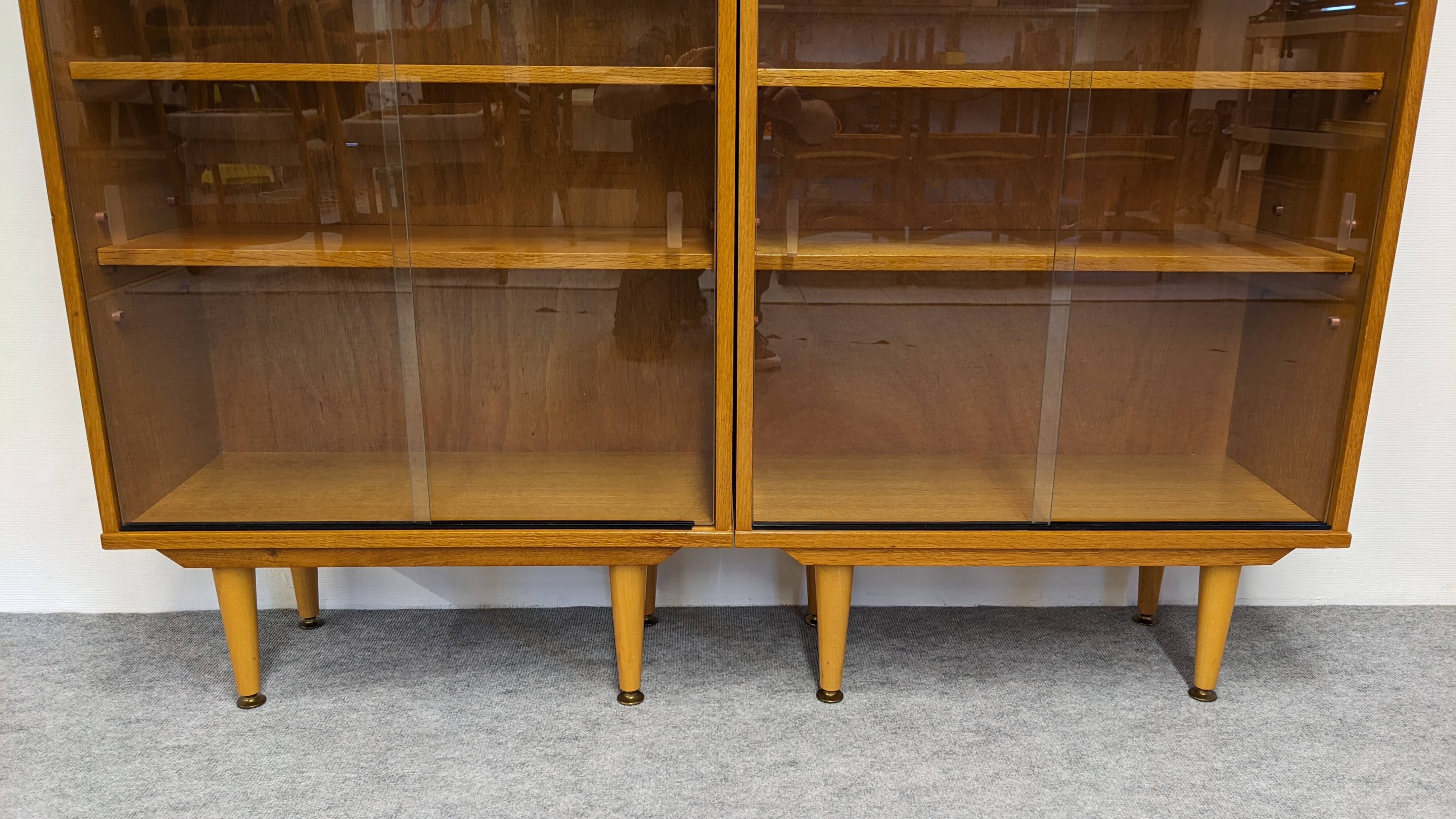 Library or display cabinet with 4 modules in light oak, France around 1960.
