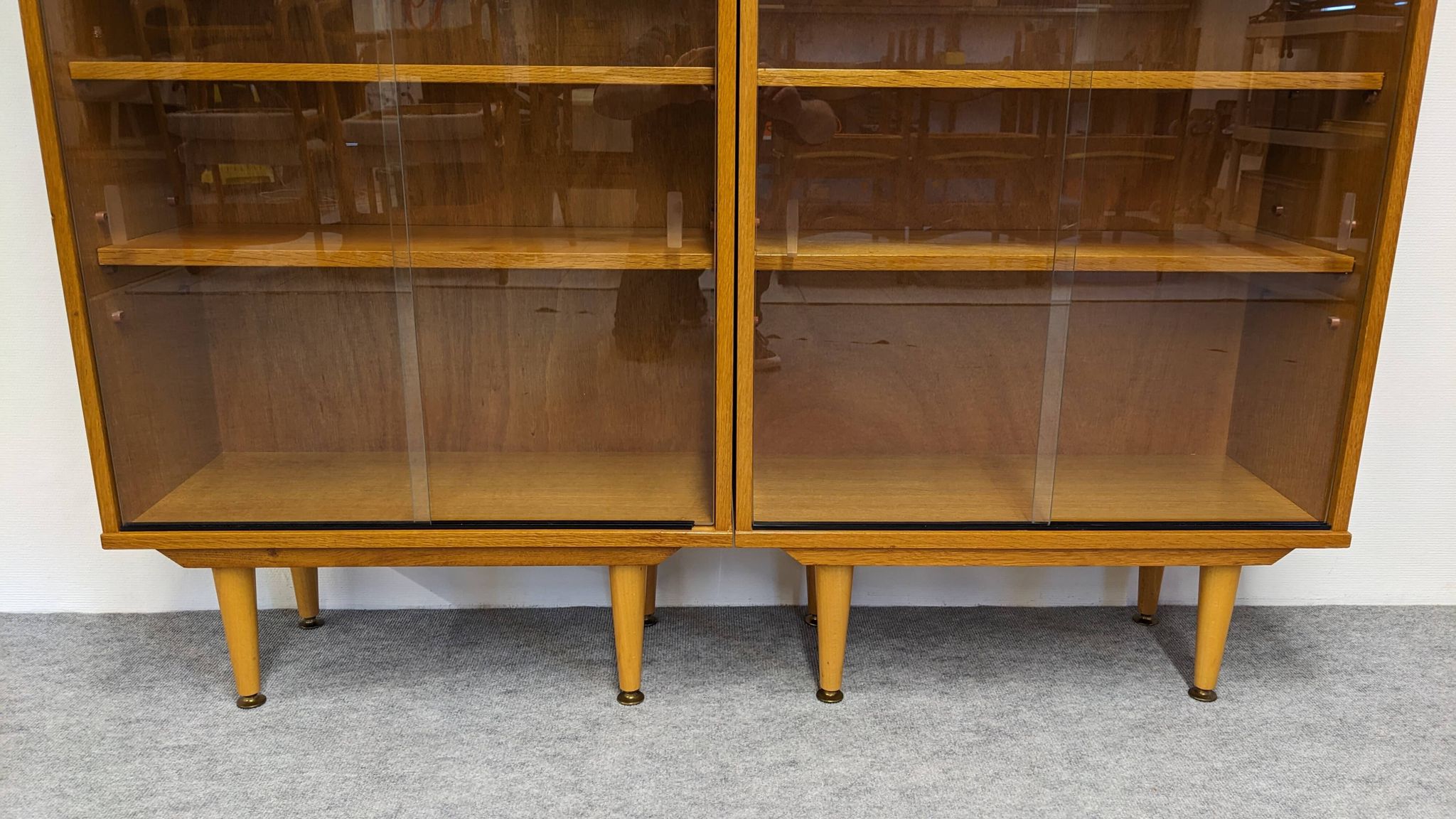 Bibliothèque vitrée 4 modules en chêne blond, France vers 1960