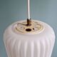 Pair of ribbed white opaline pendants, Philips, 1960s