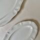 Shaped plates and dishes in Sarreguemines earthenware.