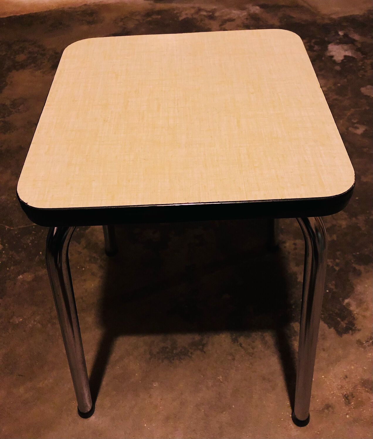 Pale yellow formica stool