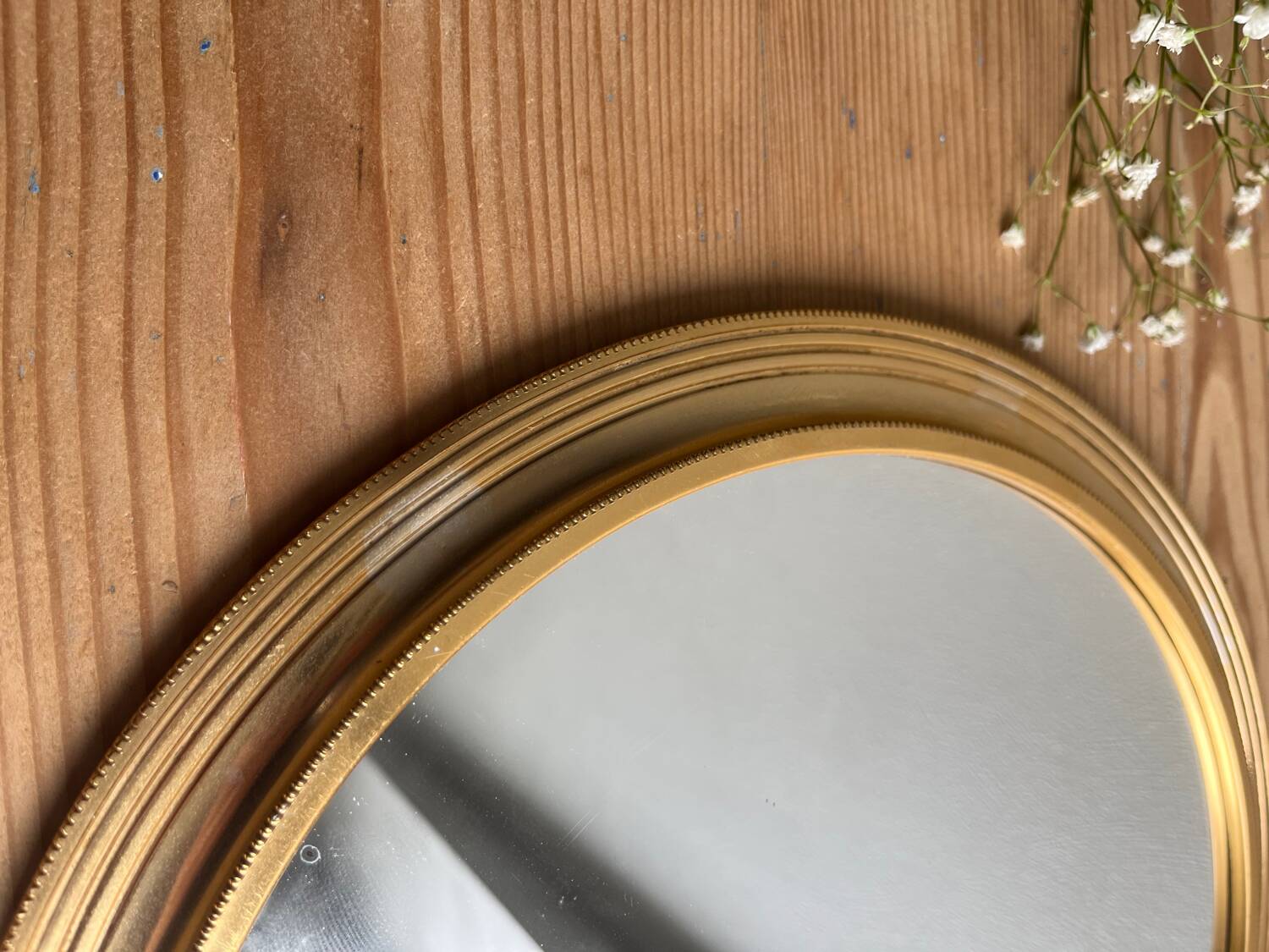 Vintage gold round mirror