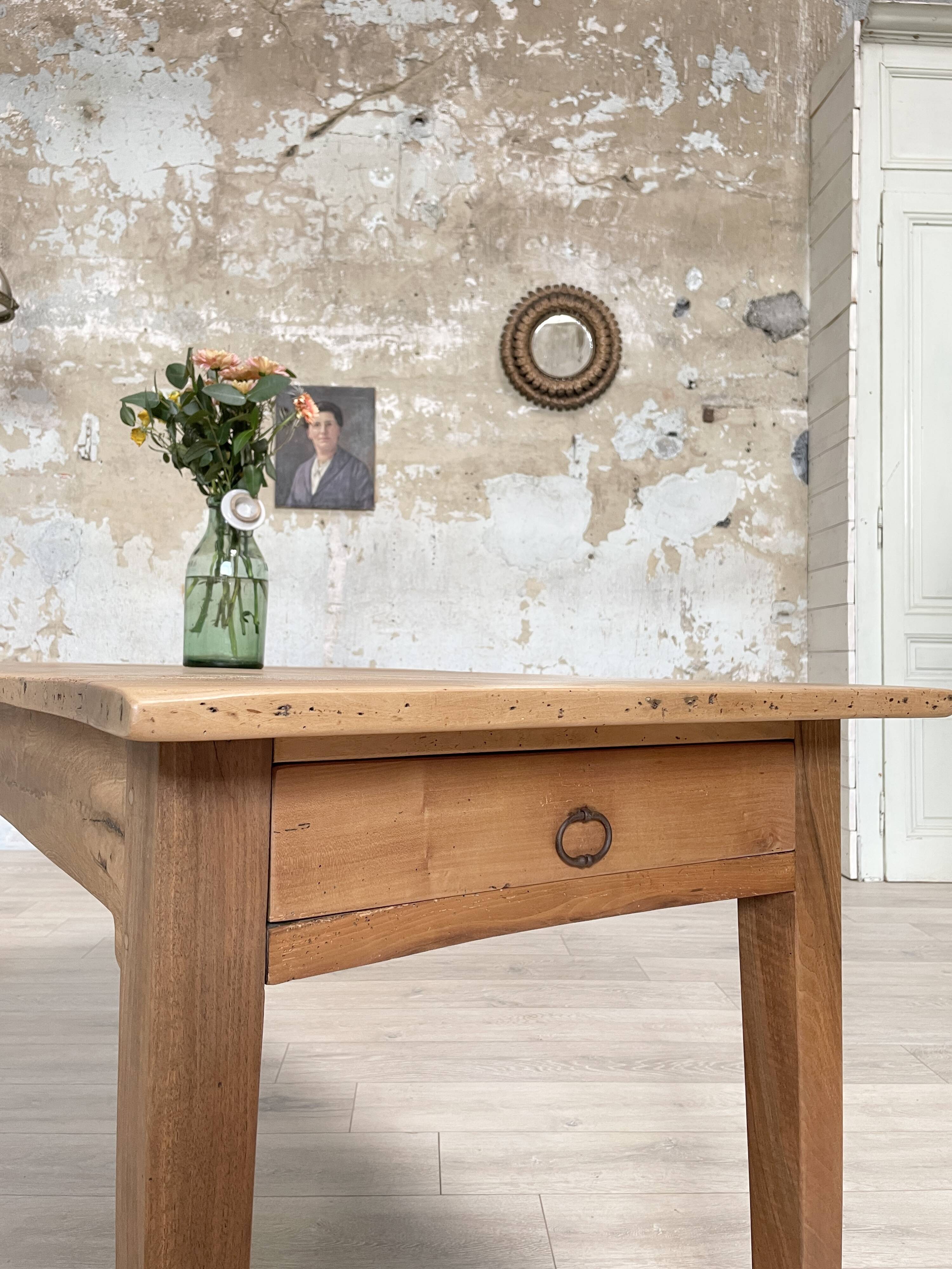 Vintage farmhouse table with spindle legs.