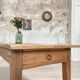 Vintage farmhouse table with spindle legs.