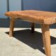 Coffee table in blond teak quadripod