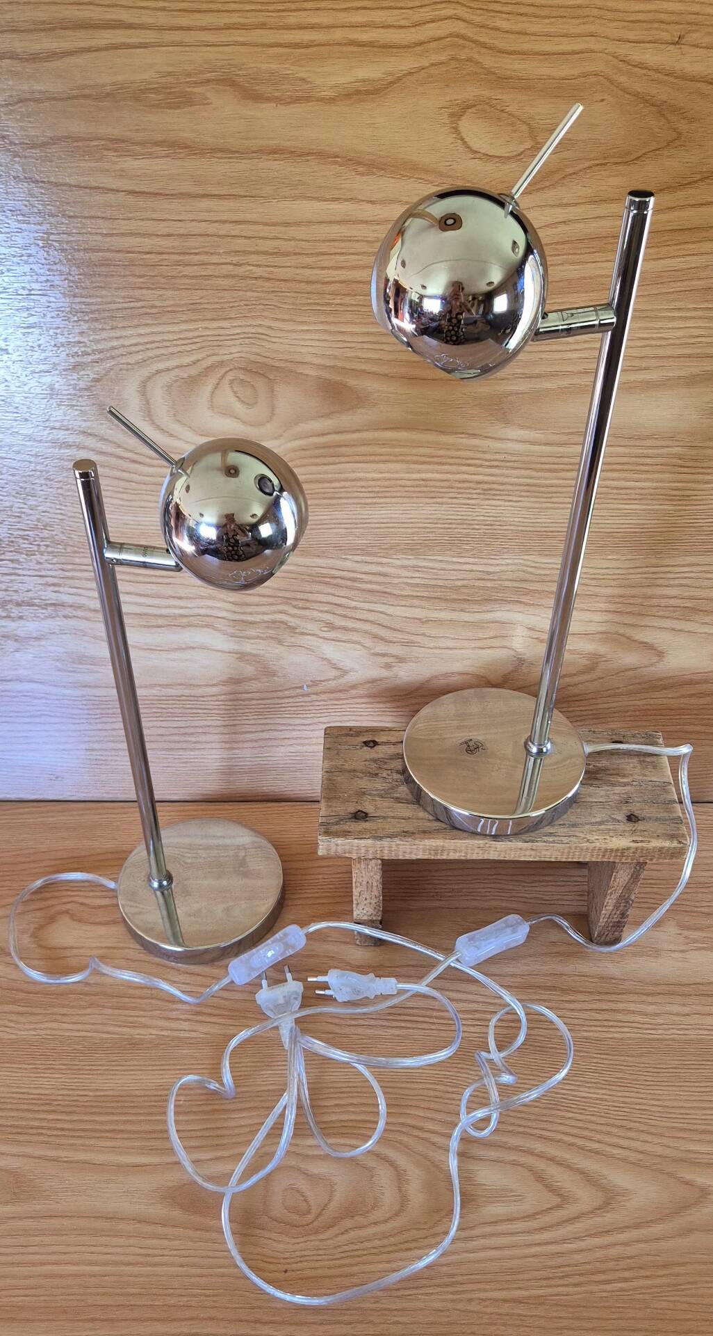 Set of 2 vintage 1970s chrome steel eye ball lamps.