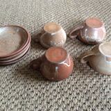 Series of 4 stoneware coffee cups