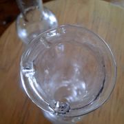 Single-stem vases made of flasks