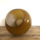 Suspension in amber opaline