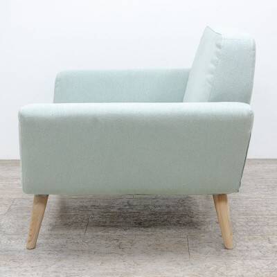 Softline Scope armchair in turquoise fabric