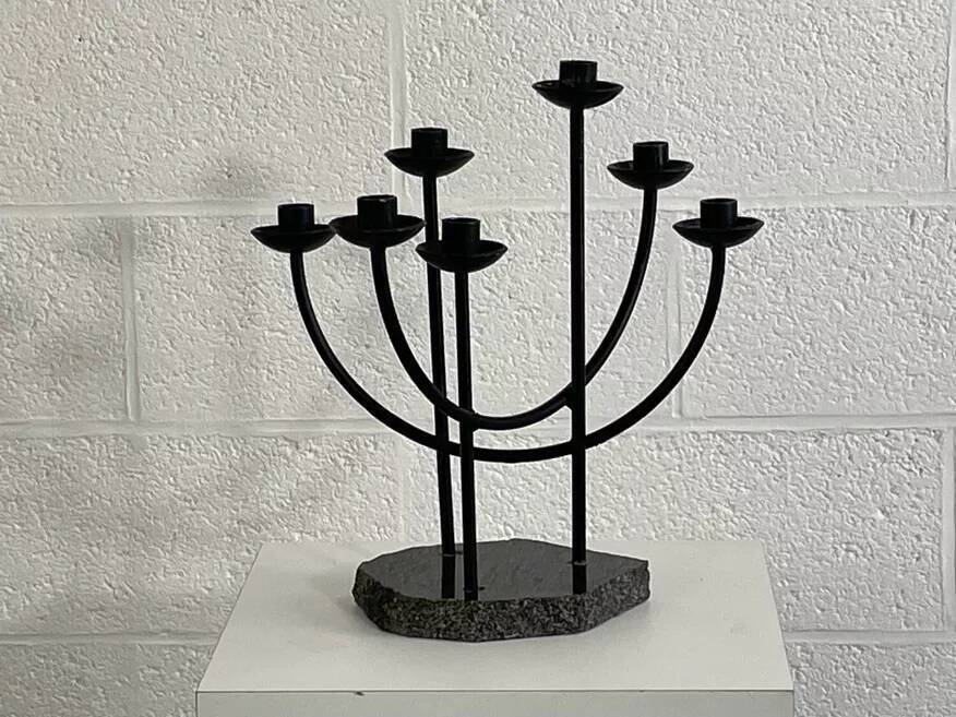 Metal candle holder and black quartz base