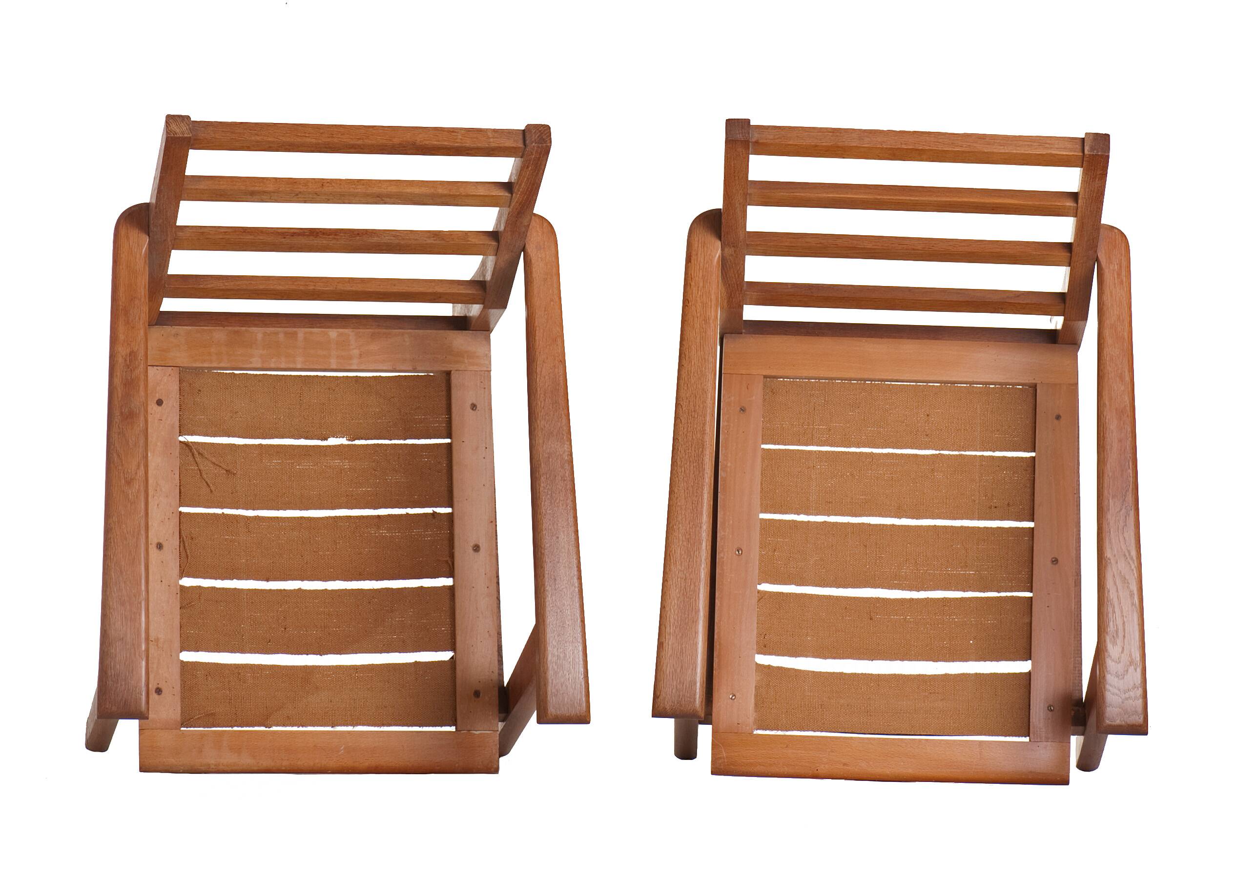 Pair of low oak armchairs 1950