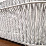 White perforated sheet metal planter by Mathieu Mategot