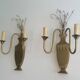Pair of brass and crystal wall sconces