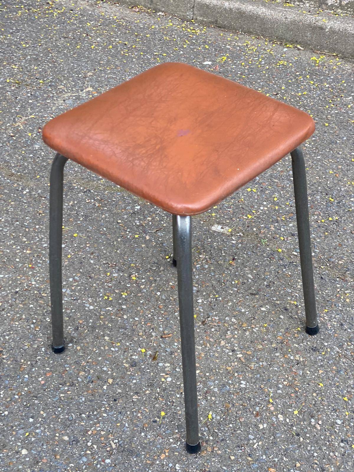 Vintage square stool in steel and brown leather.
