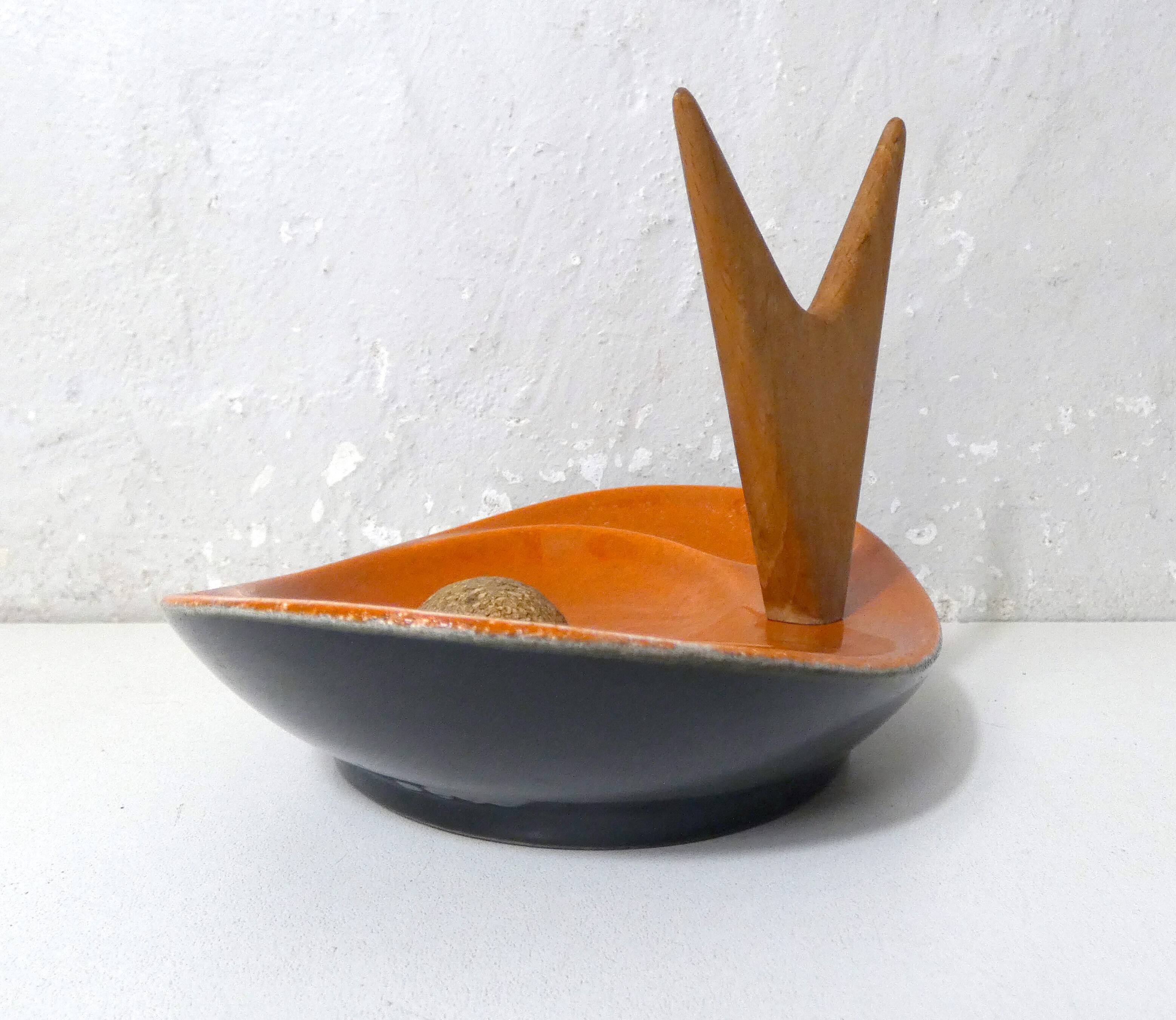 old ceramic and asymmetrical wood pipe ashtray