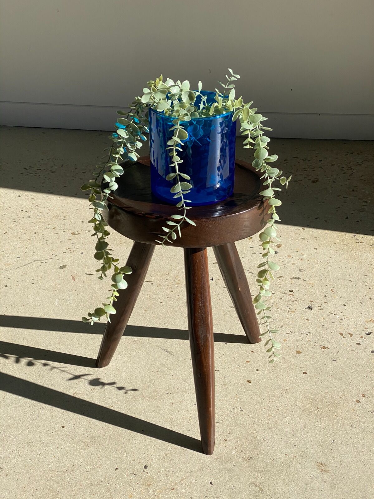 Brown solid wood stool seated circular dug