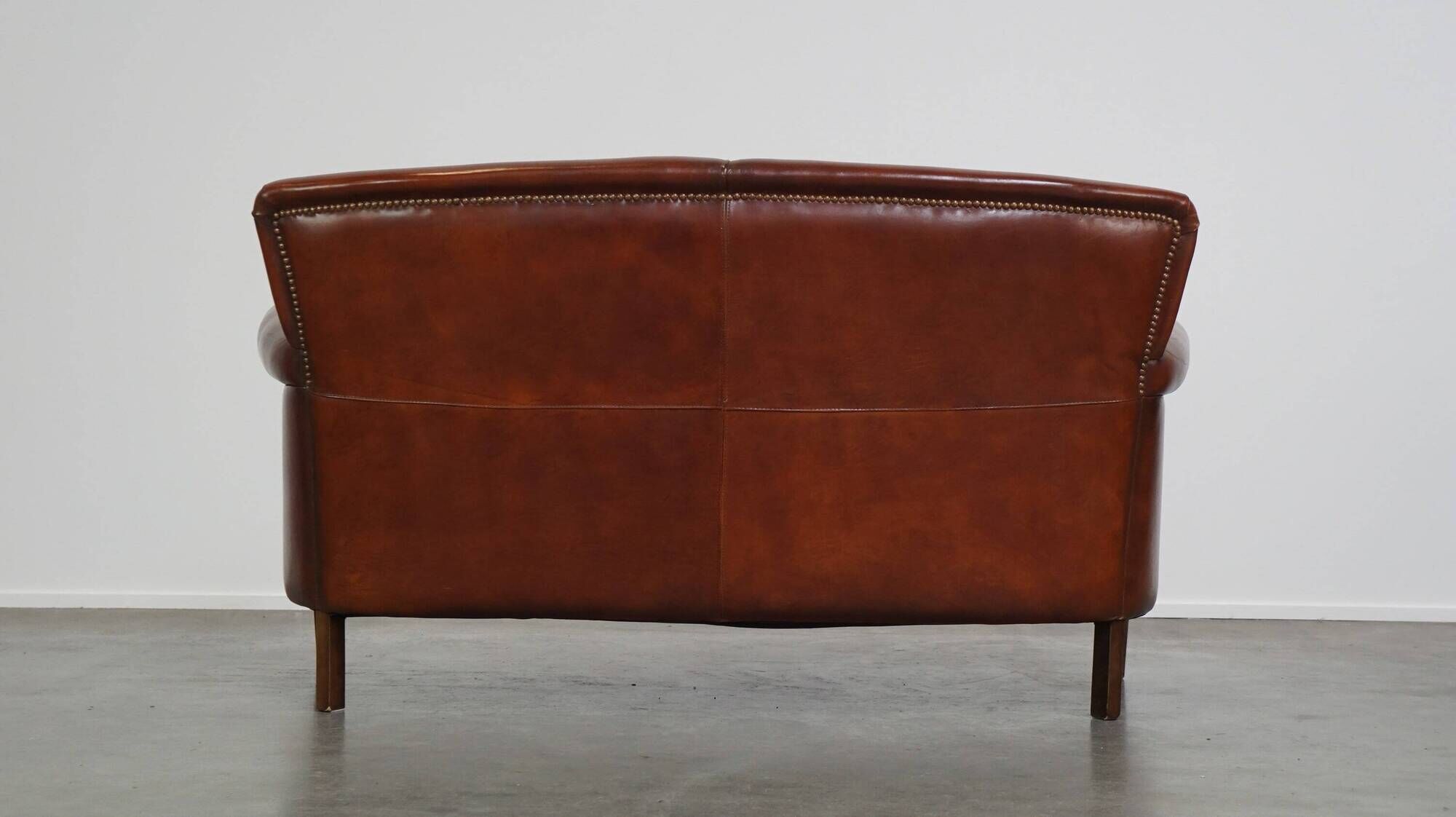 Classic 2 seater sheepskin sofa with beautiful colours and good seating comfort