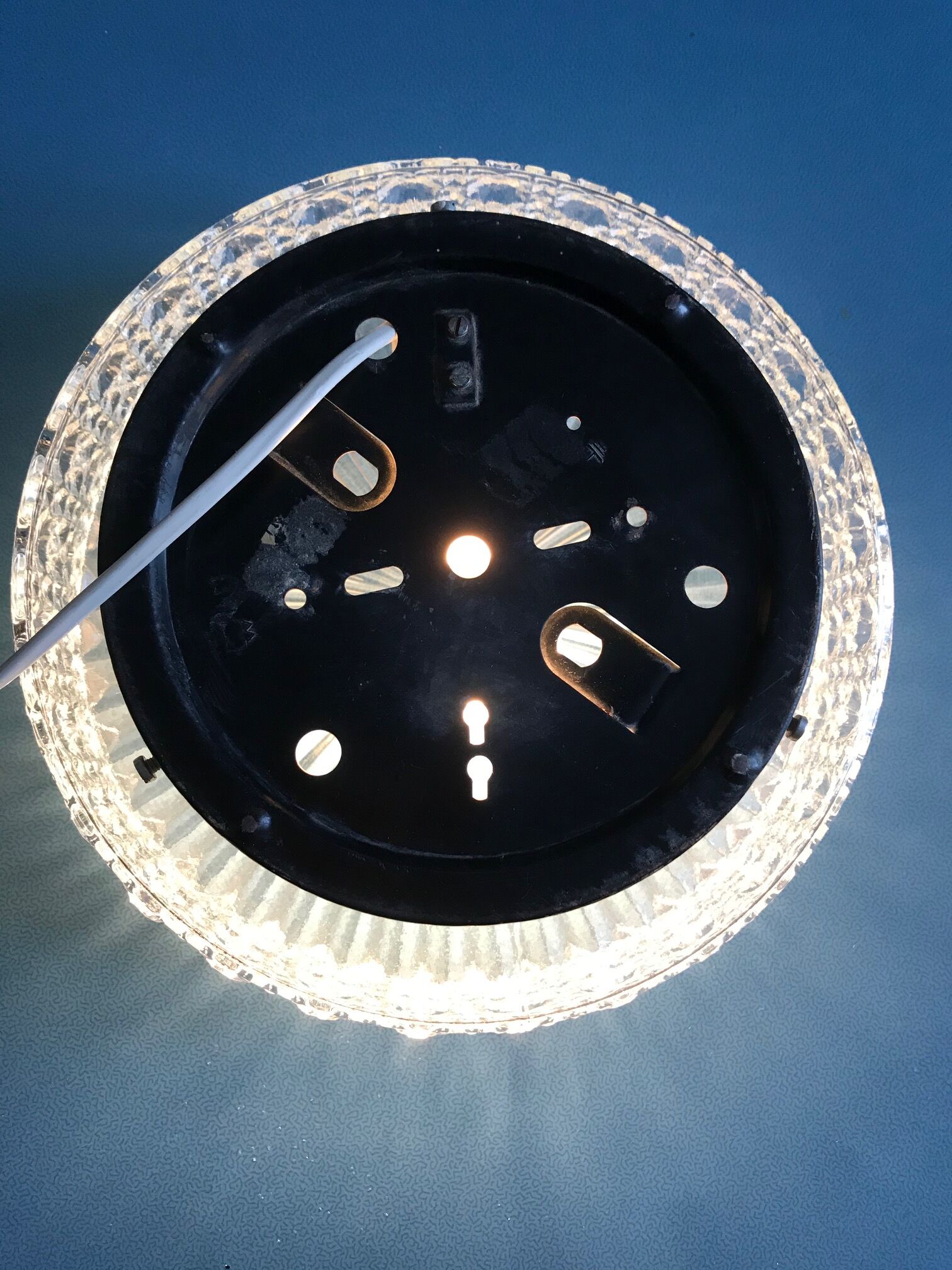 Round ceiling light in chiseled glass