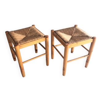 2 wooden stools with square straw seats