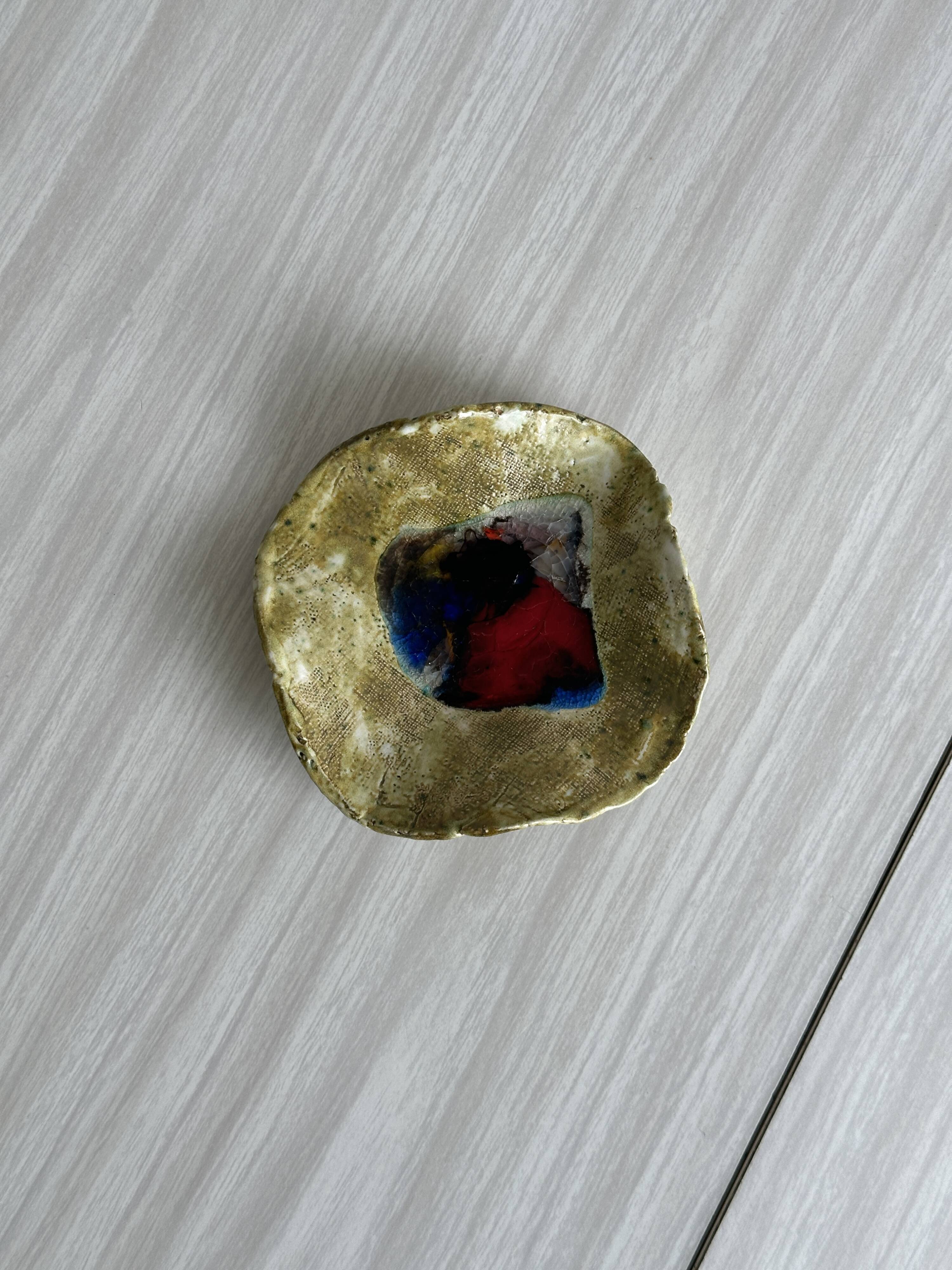 Handmade colorful ceramic pocket emptier, decorative object