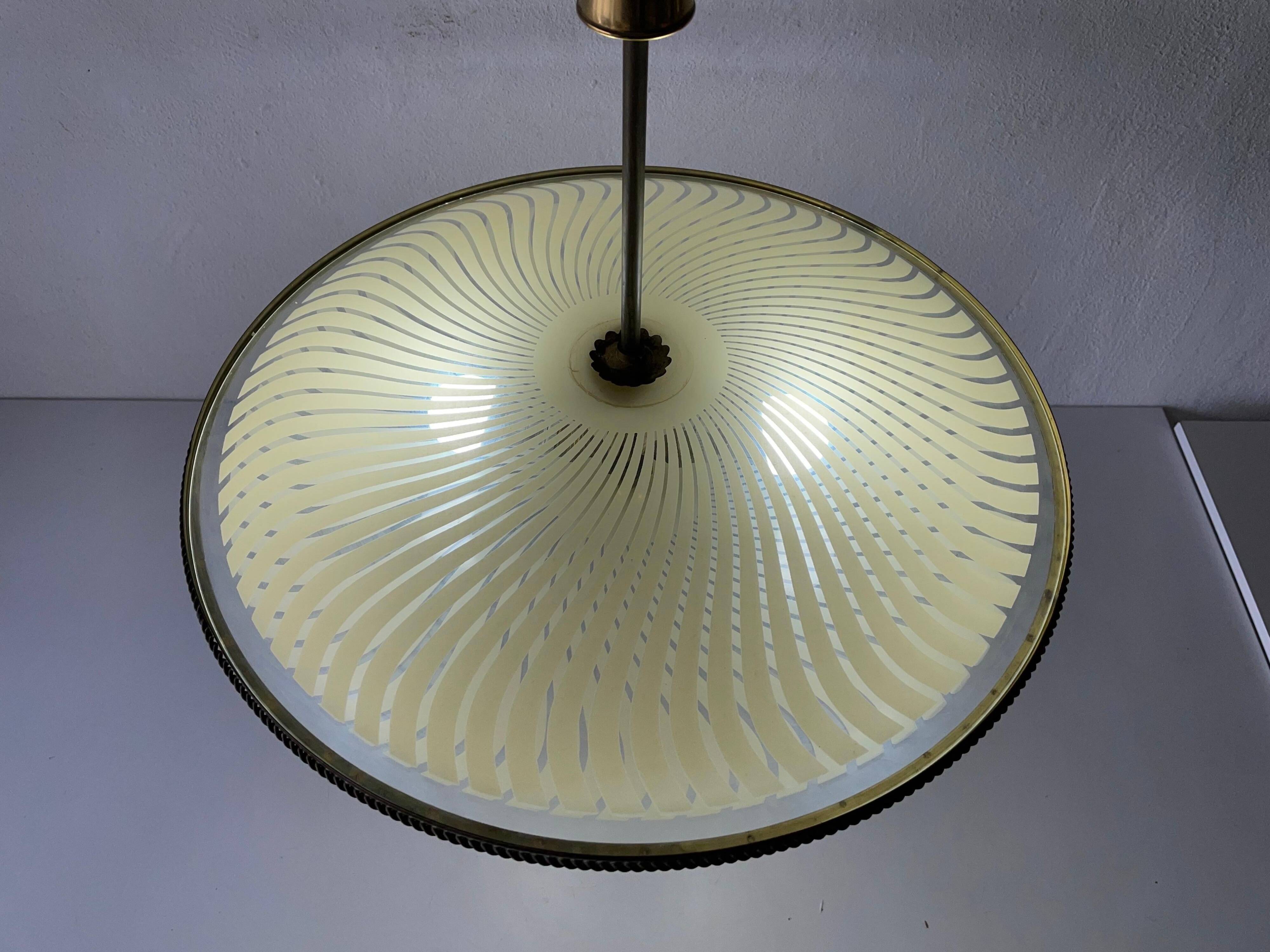 Large UFO design ceiling light in brass and printed glass, 1950s, Italy.