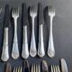 12 Forks and 12 cheese or dessert knives – Orfèvrerie Perrin Paris
