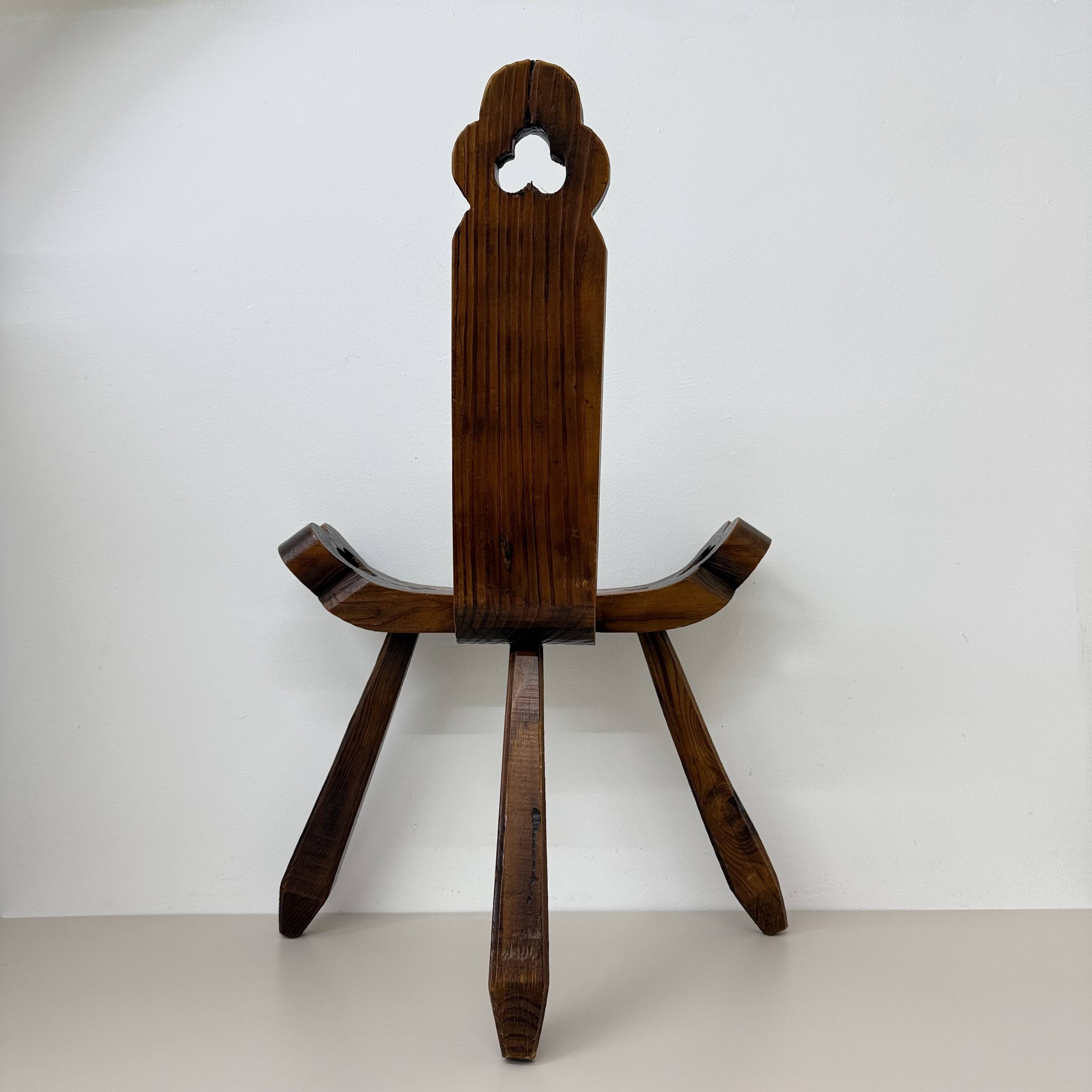 Brutalist hand carved oak Spanish tripod chair , 1970s