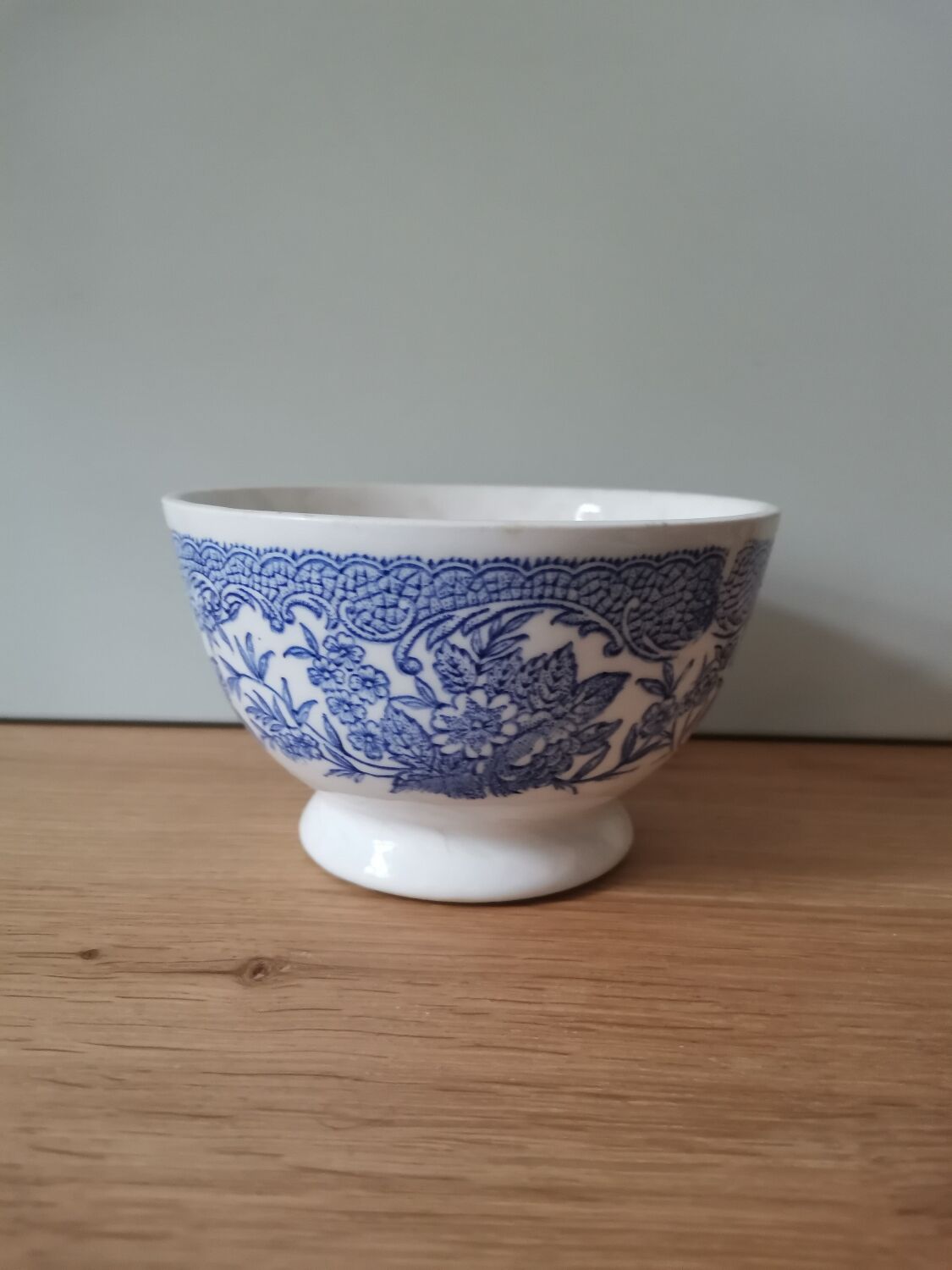 Vintage bowl with blue flower pattern
