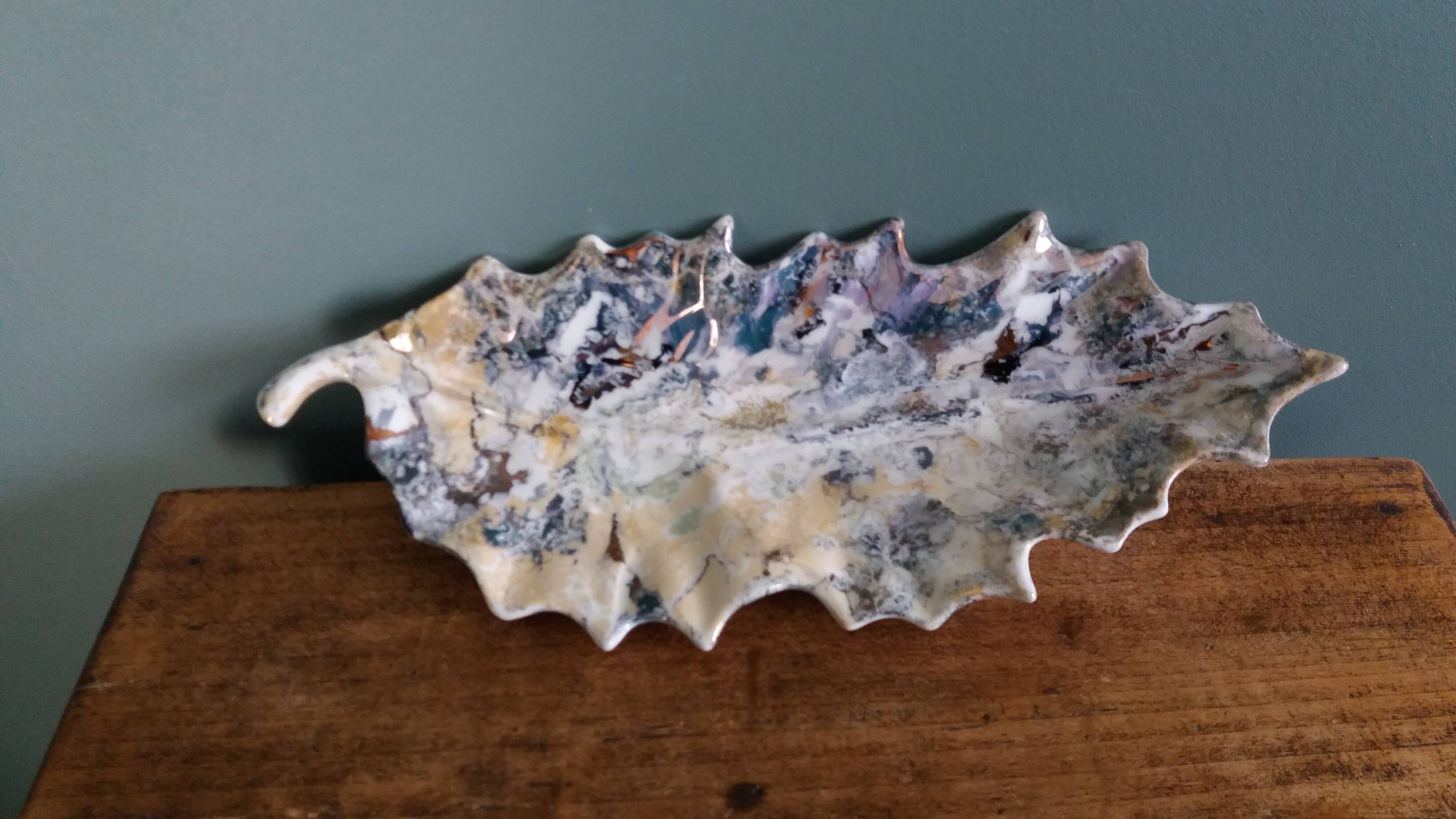 Iridescent enamelled leaf catchall, signed Gfredy.