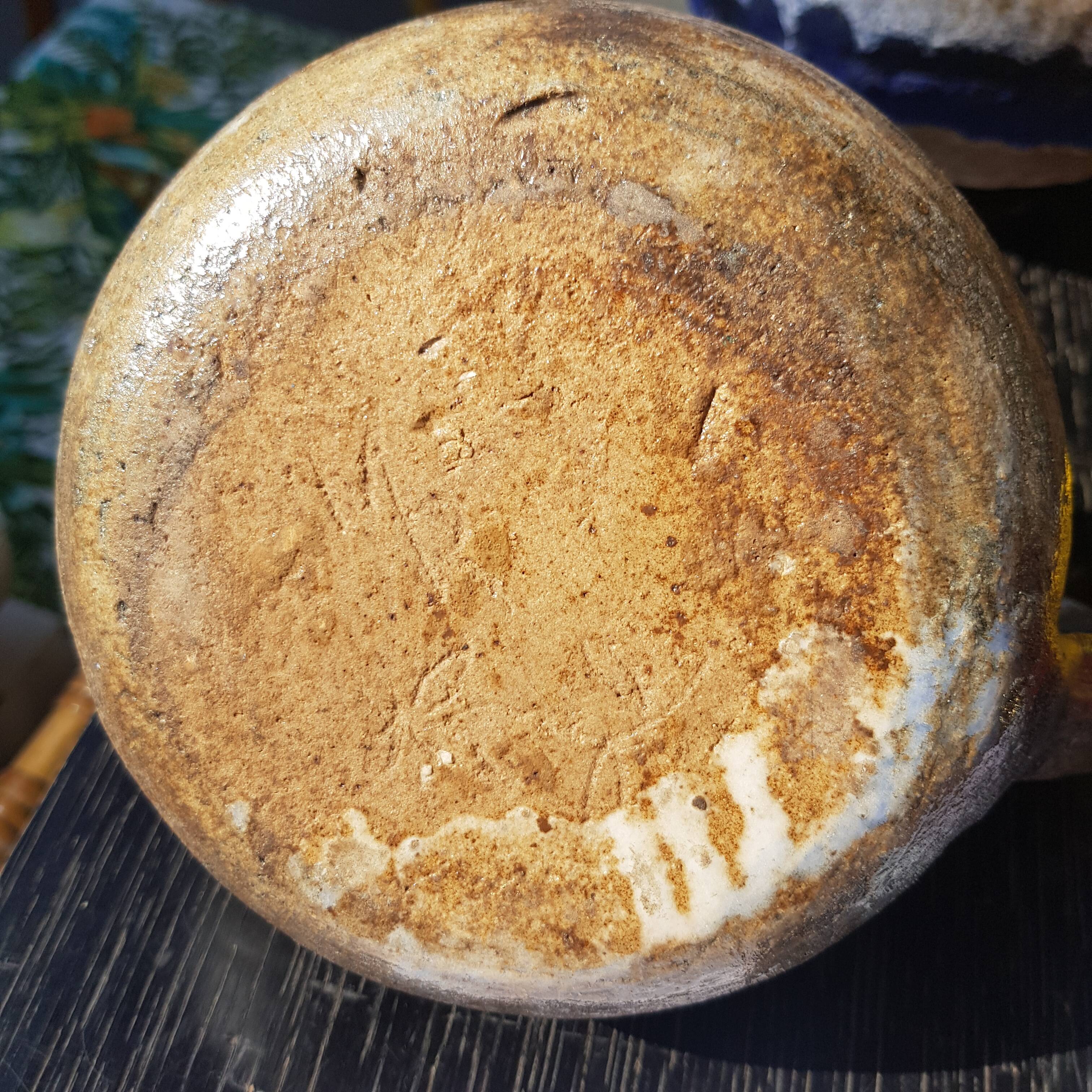 Pitcher in ancient sandstone