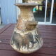 Vase vintage décor animaux préhistoire signé Armen
