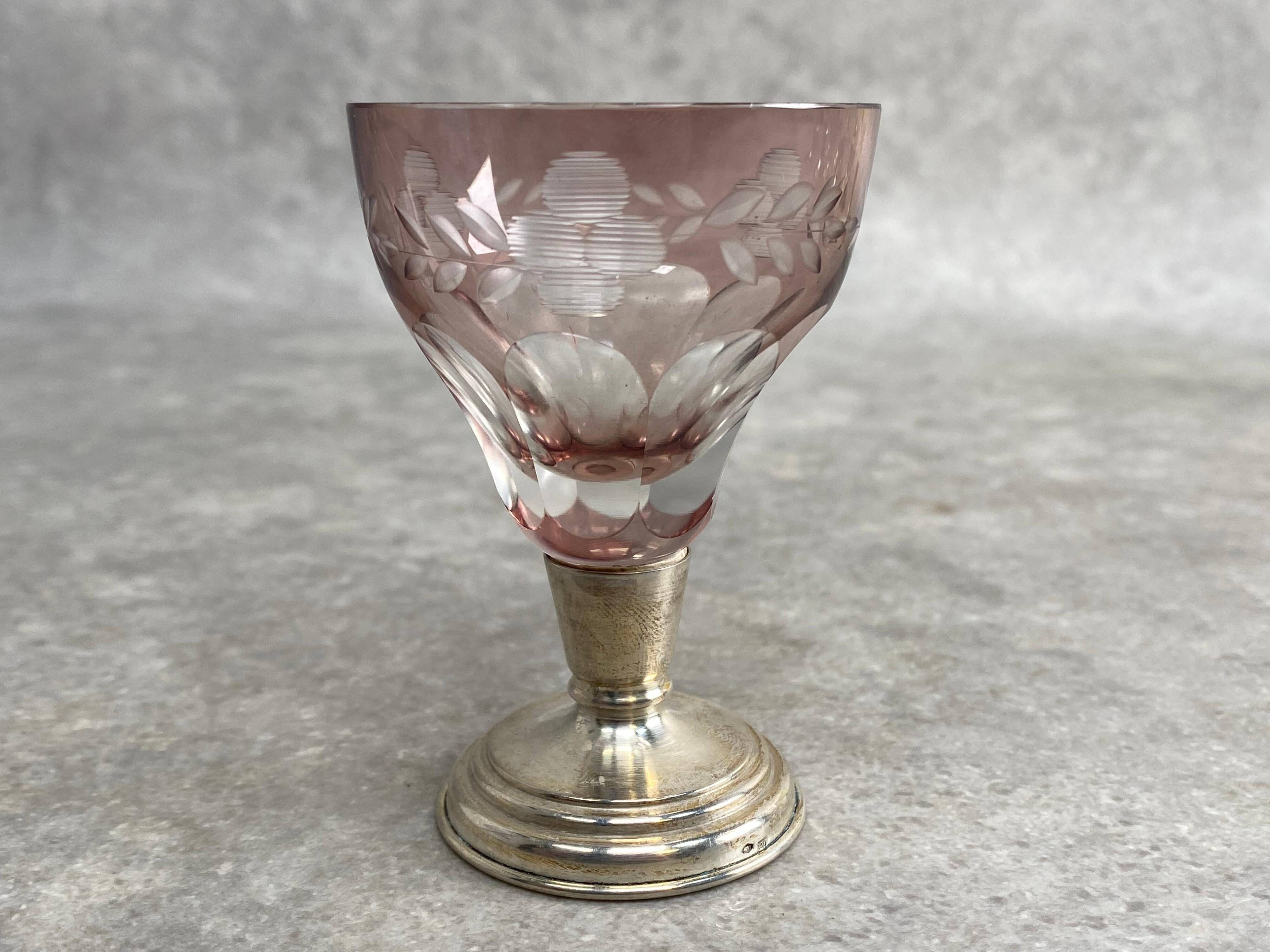 Set of 6 coloured stemmed glasses on silver stems.