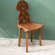 Old Swiss escabelle chair in carved wood