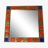 Vintage square mirror in gilded brass and enameled ceramic, 1970;