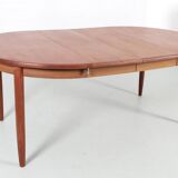 Scandinavian extendable teak dining table for 4/8 people.