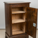 Small storage unit in solid wood and copper.
