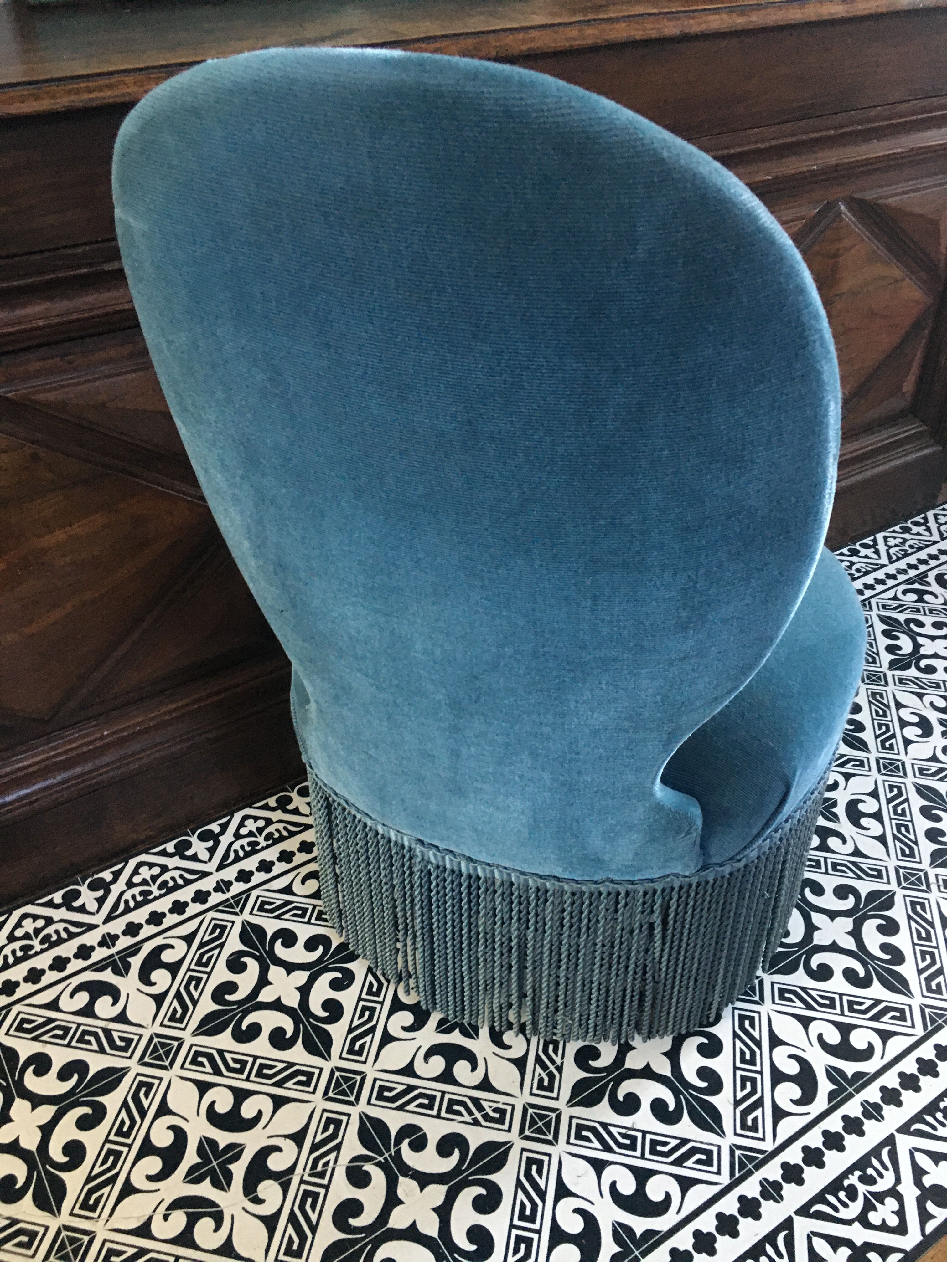 Blue heater with fringed medallion shape