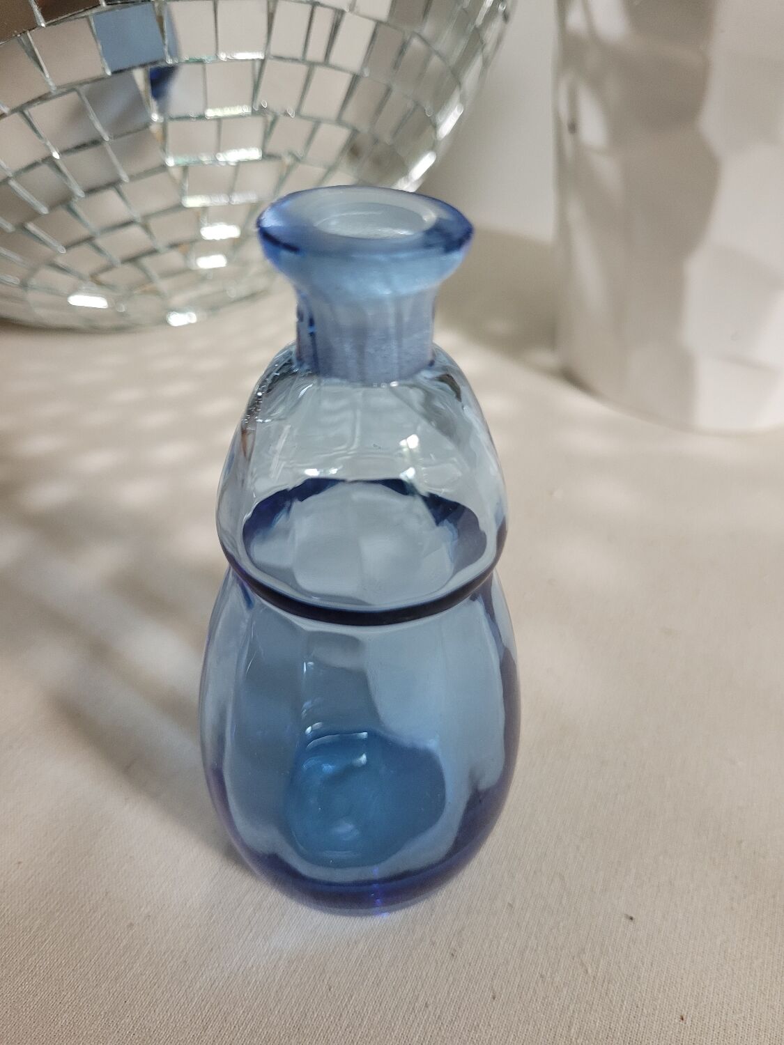 Small blown blue glass bottle