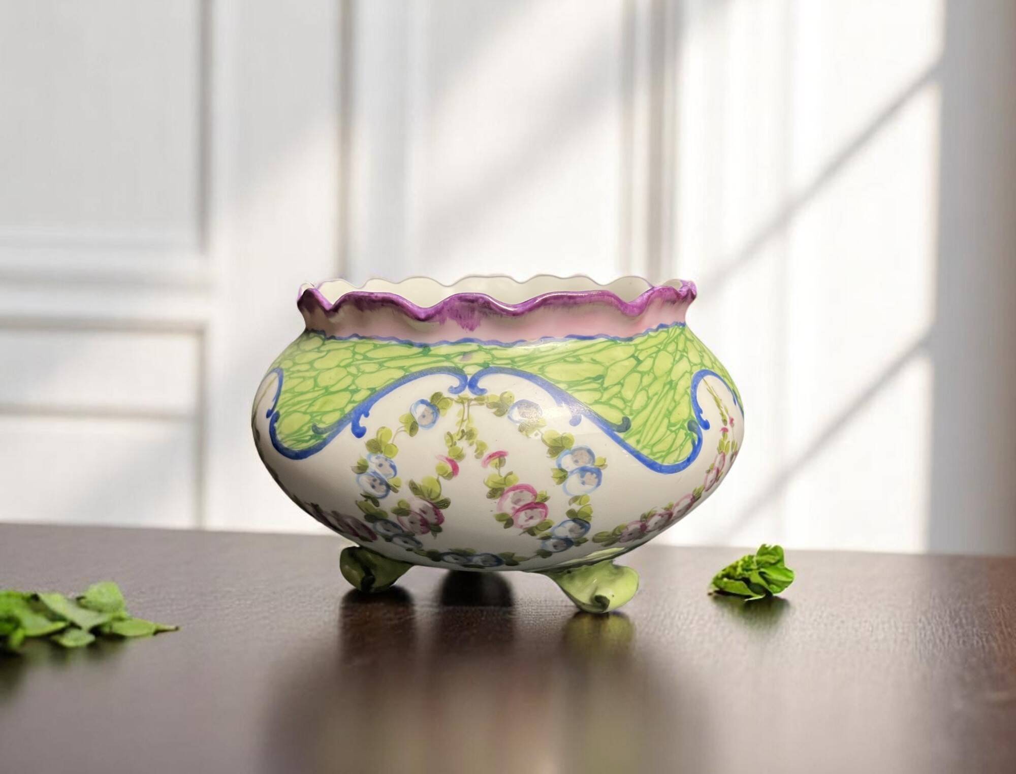 Sèvres, 20th century porcelain tripod planter with floral decoration