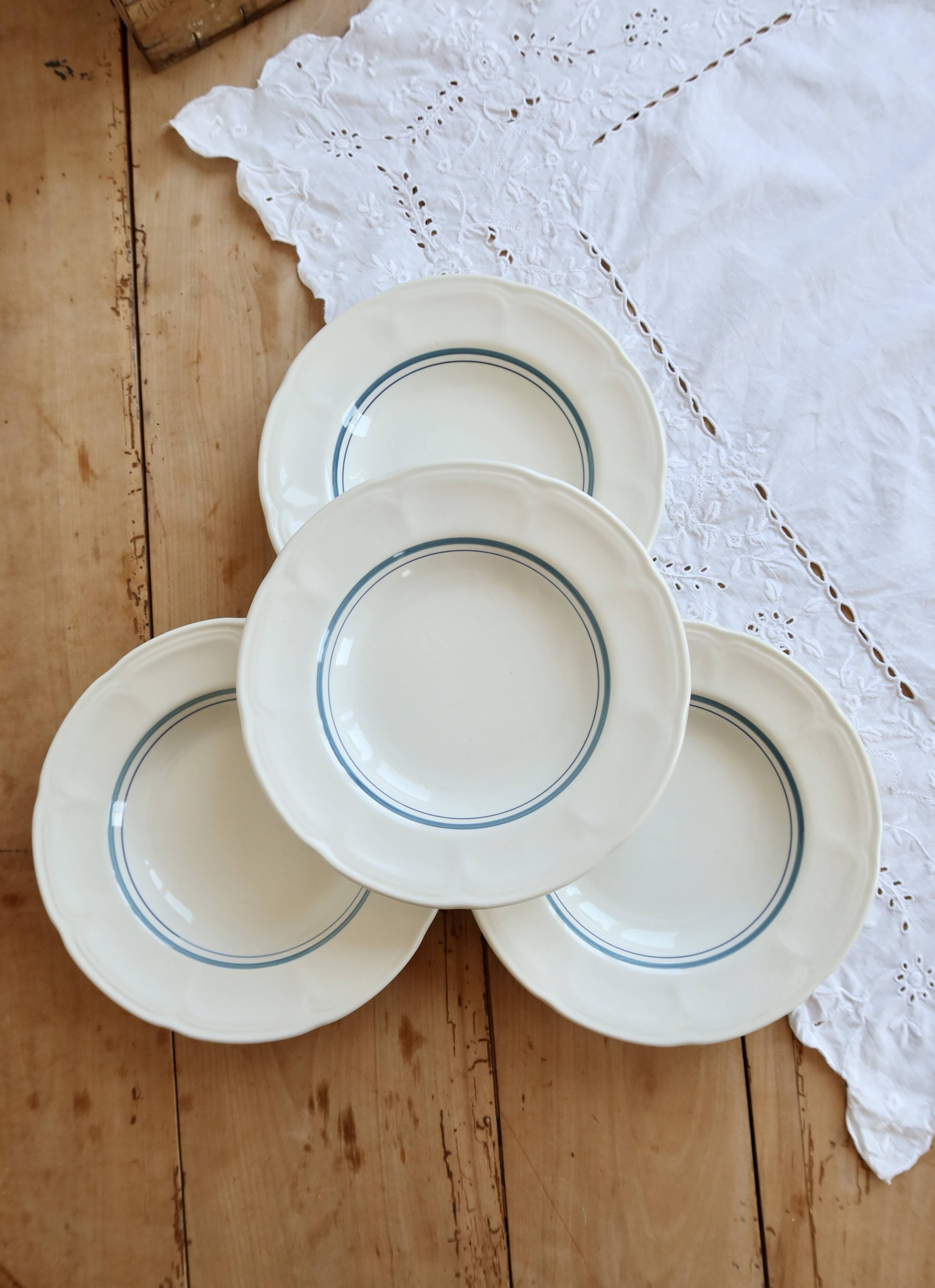 4 vintage ivory earthenware deep plates – double blue borders