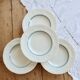 4 vintage ivory earthenware deep plates – double blue borders