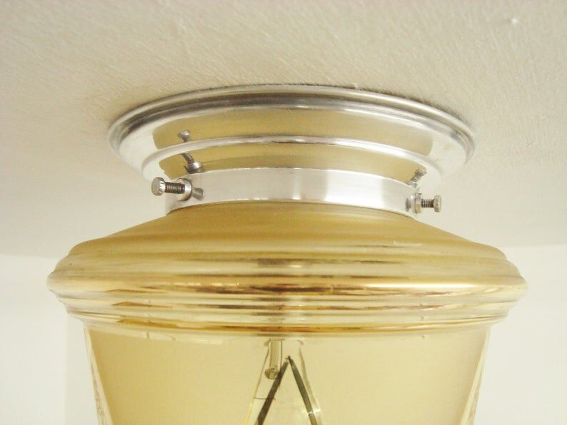 Ancient lantern of the 50s golden glass