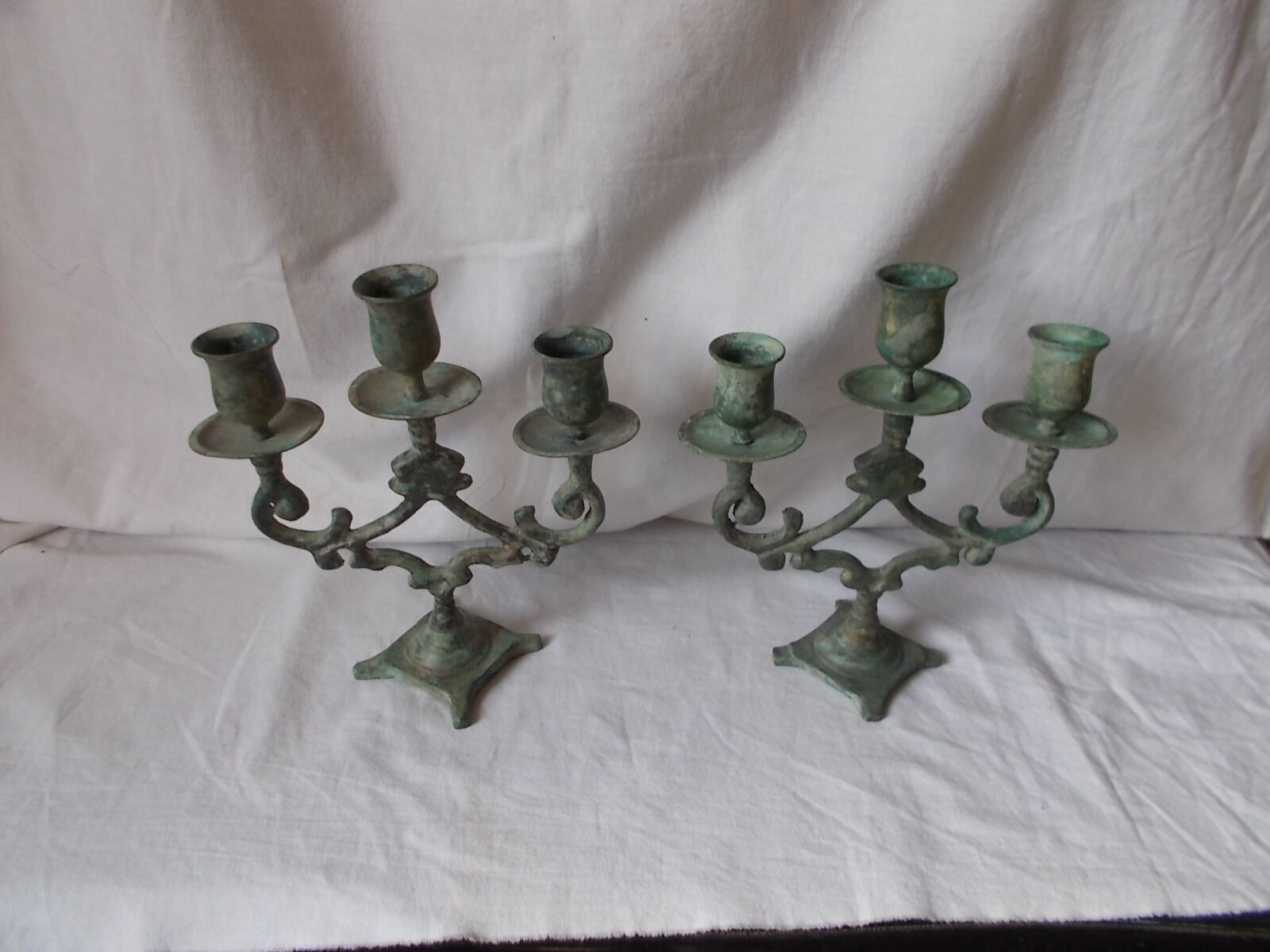 Pair of metal candlesticks patina green grey