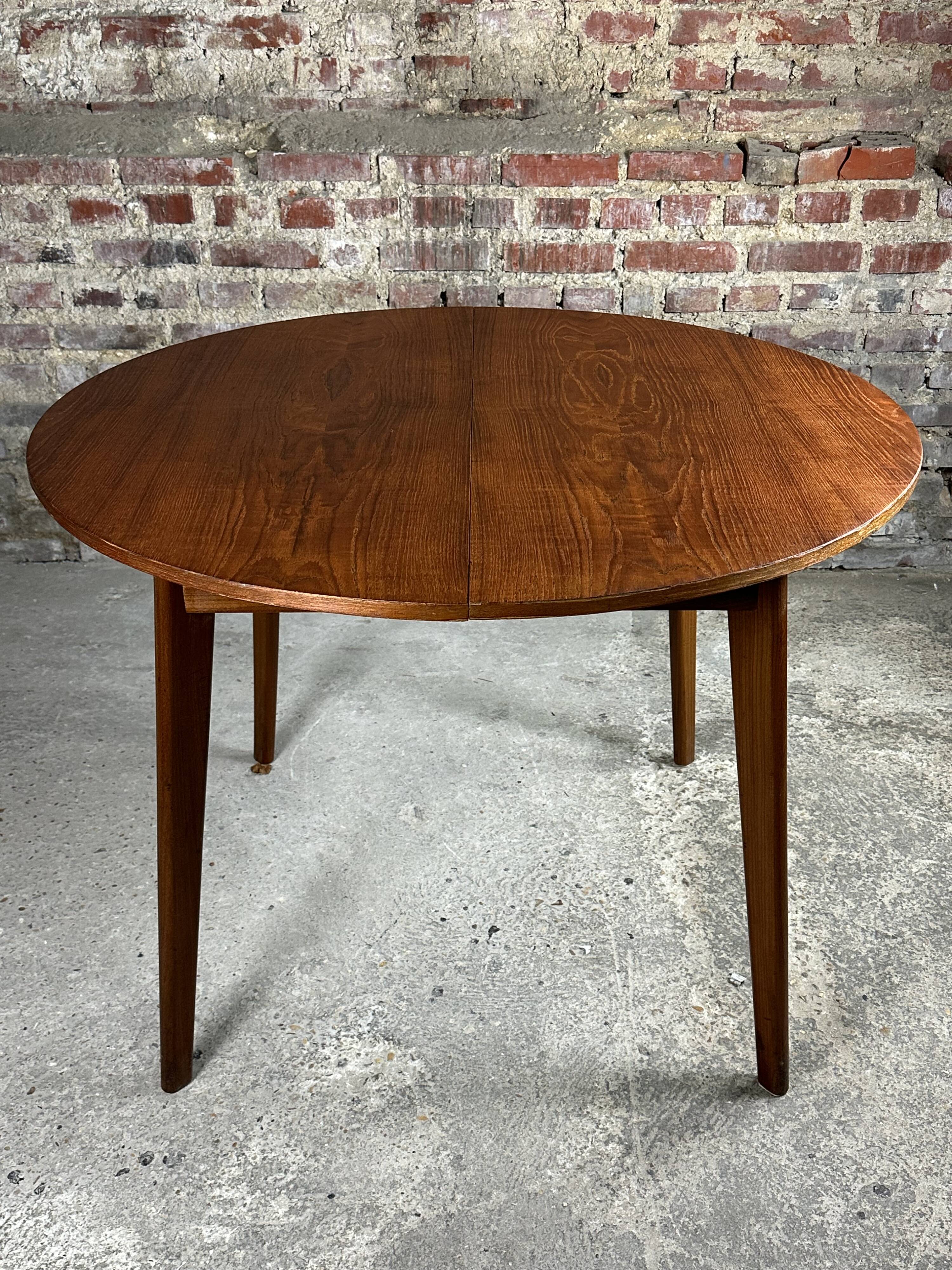 Scandinavian round teak table with integrated extension 70'S