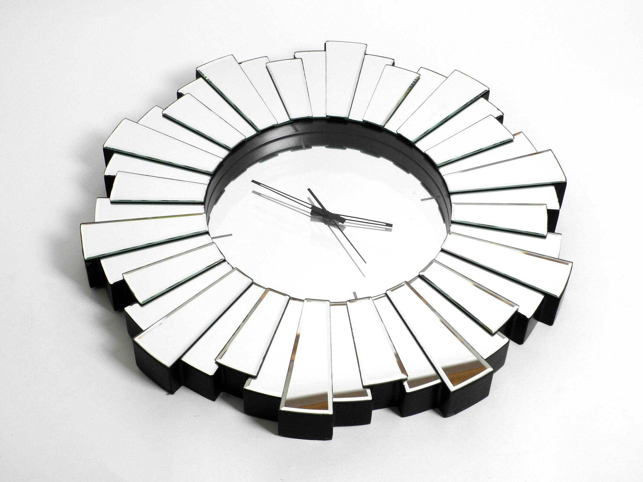 Gigantic rare heavy Sunburst mirror wall clock from the 1970s | Ø 70 cm