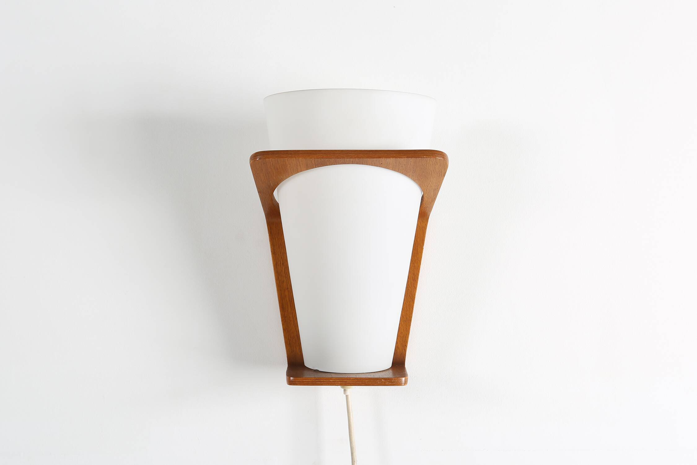 Wall lamp NX 41 by Louis Kalff for Philips in curved teak plywood, 1959