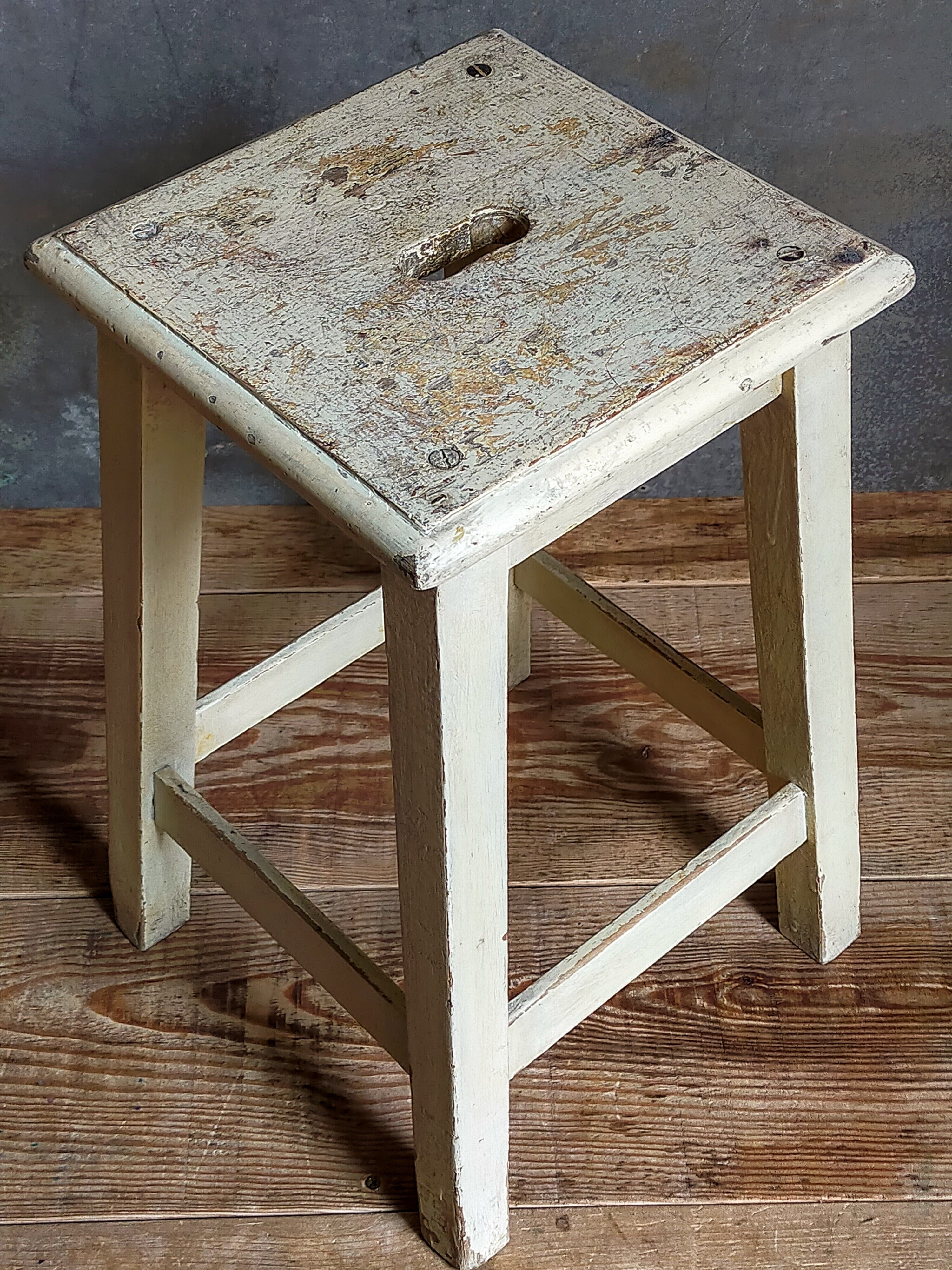 Wooden workshop stool with old patina