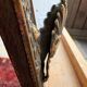 Napoleon III style mirror with gilt brass side panels